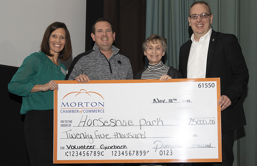 Leigh Ann Brown, Morton Chamber of Commerce executive director, with Joel Dickerson and Teressa Zobrist of the Morton Park District and Tim Mueller of Morton Community Bank