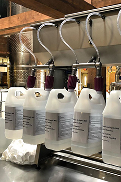 Black Band Distillery repurposed its equipment and staff to manufacture and bottle hand sanitizer.