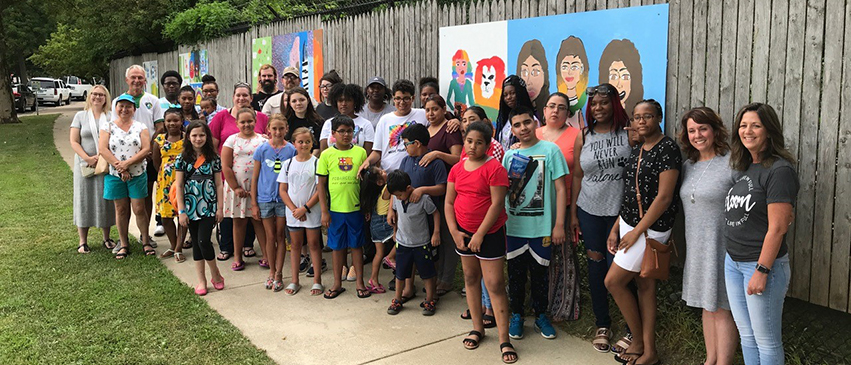 Ribbon cutting ceremony at Glen Oak Park for Big Picture's mural program with the Peoria Park District, July 2019