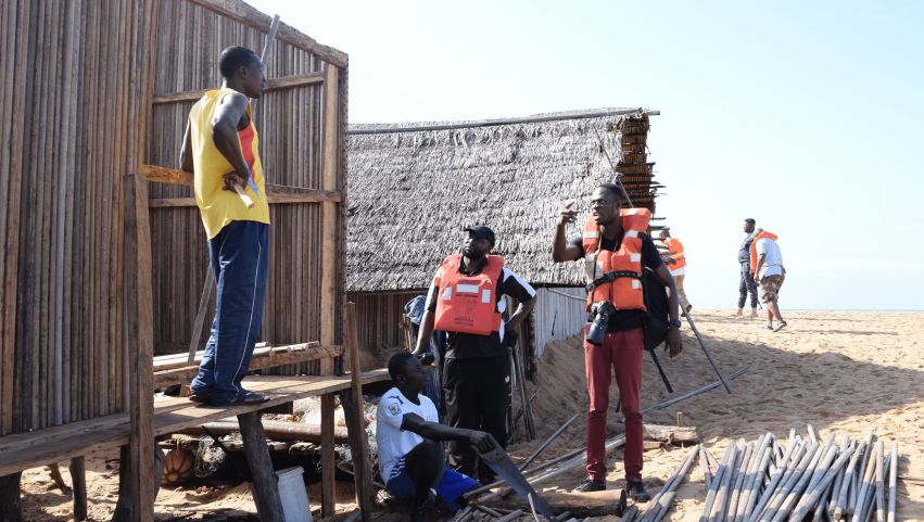 Jackson learning about a community’s adaptation methods to coastal erosion in the Republic of Côte d’Ivoire (Ivory Coast)