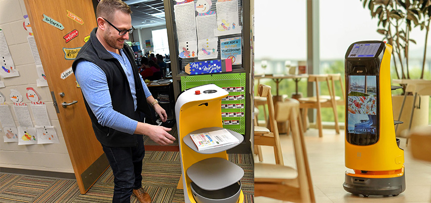 A Robot delivering a book and a robot in a dining area.