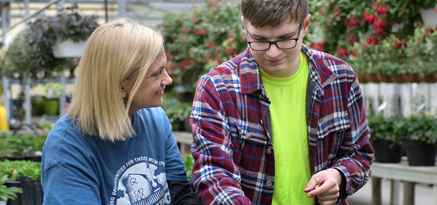 Laura Sniff reviewing flowers