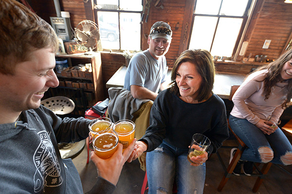 patrons enjoying beer