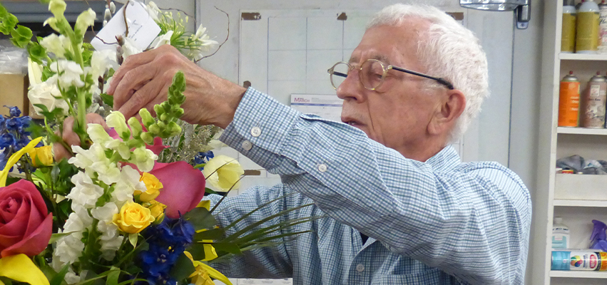 Dan Callahan arranging flowers