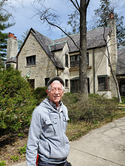 Dan Callahan in from of a home.