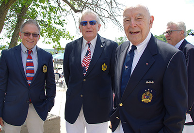 Photo of men in Blue blazers